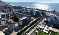 AL-1192-1, Kargıcak’ta Deniz Manzaralı, Havuzlu Otel Konseptli Daire
