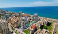 AL-1274, Alanya Mahmutlar'da Denize Sıfır Projesinde Zengin Sosyal Olanaklara Sahip 58 m² Daireler