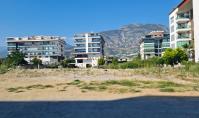 AL-1652-1, Alanya Kestel’de Sahile Yakın Seçkin Yaşam – Uzaktan Deniz Manzaralı, Havuzlu ve Avantajlı Konumda 3 Odalı Daire