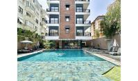 AL-1760, Alanya'da 4. katta, 60 m²'lik aydınlık, mobilyasız, Amerikan mutfaklı 1+1 daire – Kapalı ve açık yüzme havuzları, plaja 450 m uzaklıkta