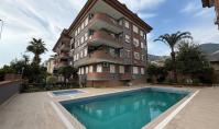 AL-1798, Alanya, Sugozu'da Amerikan mutfaklı, mobilyalı 2+1 daire (120 m²) - Havuz, bahçe ve 7/24 güvenlik