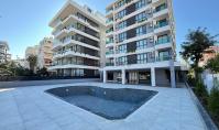 AL-1824, Alanya Merkez’de Kleopatra Plajı’na 250 m uzaklıkta, havuz, sauna ve spor salonu bulunan mobilyalı 2+1 daire (75 m²)