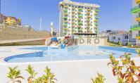 AL-1880, 3. katta, balkonlu, yeni, mobilyasız 1+1 daire (55 m²), aqua parklı büyük havuz, sauna ve spor salonu – Avsallar