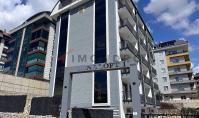 AL-1949, Havuz Terasının Üstündeki 1+1 Giriş Seviyesi Daire – 50 m², Amerikan mutfaklı, spor salonu ve saunalı, Upper Oba