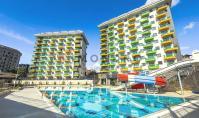 AL-1942, Komplekste Su Kaydırağı Havuzu ve Kapalı Spa – Avsallar’da Balkonlu 55 m²’lik 1+1 Daire (3.300 € indirimli)