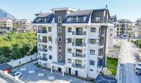 AL-1980, Oba’da, 2. katta bulunan, oturma izni almaya uygun, mobilyalı 52 m²’lik 1+1 daire – Havuz, sauna ve spor salonu kompleksi