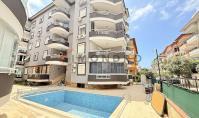 AL-2005, 115 m²’lik Geniş, Mobilyalı, İki Banyolu ve İki Balkonlu 2+1 Daire – Havuzlu Bahçe, Denize 200 m, Oba