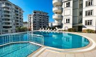 AL-2086, Su Kaydırağı, Sauna ve Tenis Kortu Bulunan Havuz – İki Banyolu, 120 m²’lik Mobilyalı 2+1 Daire, Denize 800 m, Tosmur