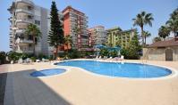 AL-2143, Site içinden doğrudan plaja erişim – İki banyolu ve geniş balkonlu, 105 m²’lik mobilyalı 2+1 daire, Mahmutlar