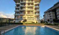 AL-2164, Plaja 200 m uzaklıkta kapalı ve açık havuzlar – 60 m²'lik 1+1 daire, otopark dahil, Kargıcak (5.500 € indirimli)