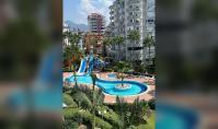 AL-2154, Balkonun Altında Su Kaydıraklı Havuz – Kapalı Havuz ve Hamamlı, Mobilyalı 62 m² 1+1 Daire, Çiğçilli