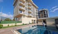 AL-2182, Plaja sadece 300 m uzaklıkta – Kapalı havuz, sauna ve yerden ısıtma sistemine sahip, 60 m²’lik mobilyalı 1+1 daire, Kargıcak