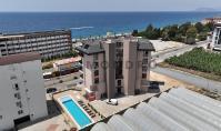 AL-2212, Denize 50 m – En üst katta yer alan, deniz manzaralı balkonlara sahip 100 m²'lik 2+1 dubleks daire; havuz, sauna ve buhar odası, Kargıçak