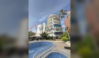 AL-2239, Denize Sıfır – Mobilyasız, 220 m²'lik, 3+2 odalı dubleks daire; geniş çatı terası ve su kaydırağı bulunan havuzlu, Mahmutlar
