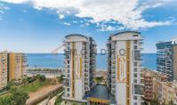 AL-2295, Havuzlu Parkı ve Deniz Manzaralı Deniz Kenarı Kulesi: Mahmutlar’da 10. katta, 55 m²’lik mobilyalı 1+1 daire