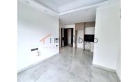 AL-2371, Sinema, hamam ve kapalı yüzme havuzu bulunan bir site içinde, güneye bakan yeni daire: Mobilyasız 50 m²’lik 1+1 daire, Mahmutlar