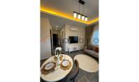 AL-2375, 2. katta, balkonlu ve açık havuzlu, 58 m²'lik modern ve mobilyalı 1+1 daire, denize 800 m uzaklıkta, Mahmutlar