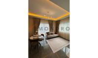AL-2377, Batıya bakan, mobilyalı, 58 m²'lik, 4. katta bulunan, balkonlu ve asansörlü 1+1 daire, denize 800 m uzaklıkta, Mahmutlar