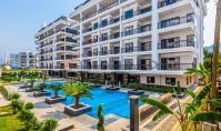 AL-2389, Denize 100 m: Havuz ve hamam kompleksinde yer alan, mobilyasız, 200 m²'lik 3+1 dubleks daire, vatandaşlık hakkı sağlayan, Kargıçak