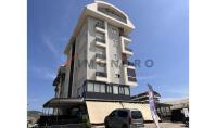 AL-2388, 2024 yılında inşa edilmiş, mobilyalı, 50 m²'lik 1+1 daire; havuz, spor salonu ve sauna mevcut; denize 450 m uzaklıkta – Kargıçak